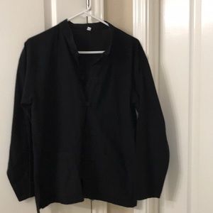 Women’s black button down blouse.